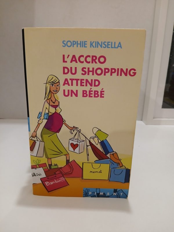 L'accro du shopping attend un bebe.